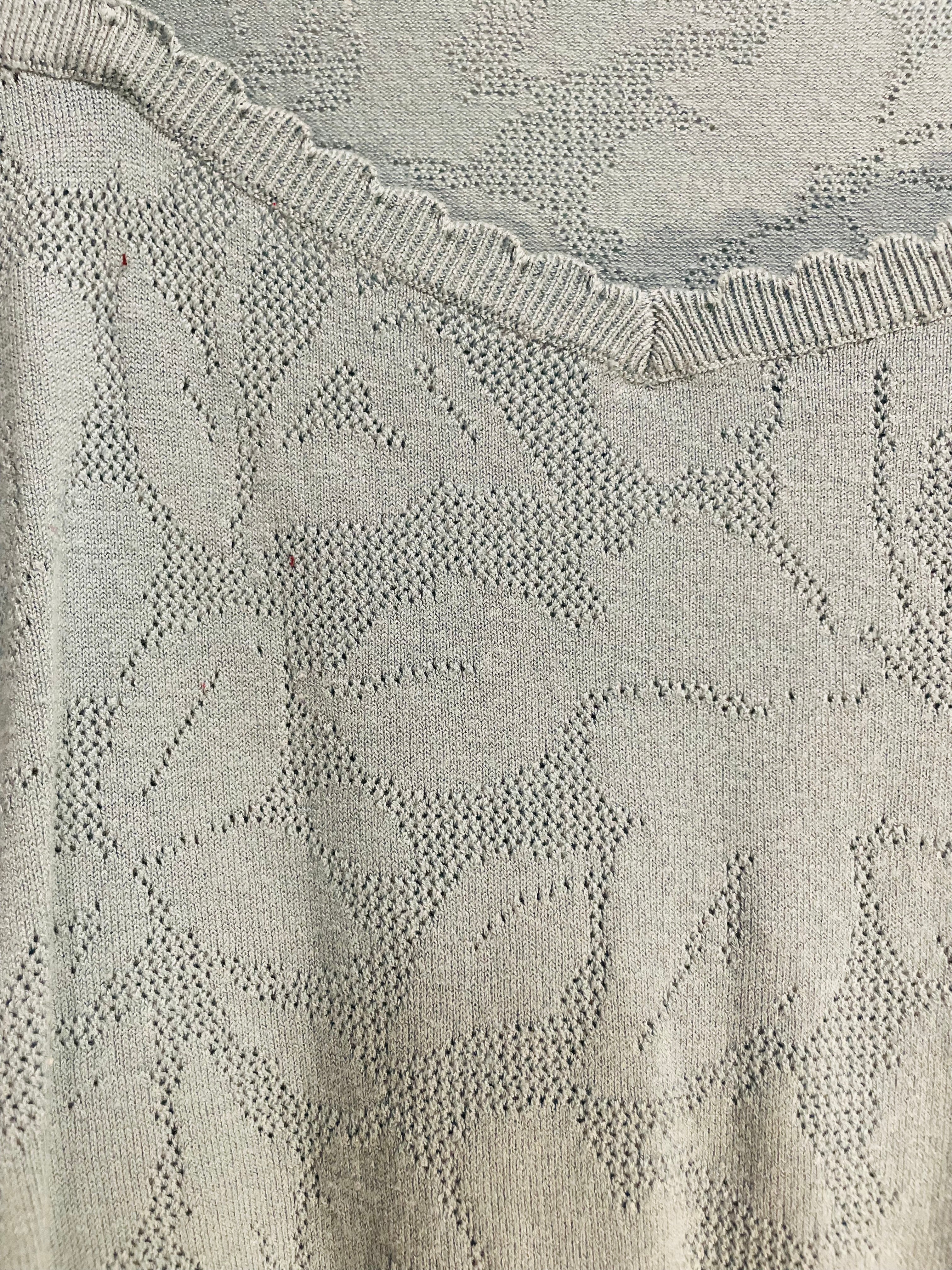 Haut tricot bleu manches courtes / marque inconnue/ taille Small