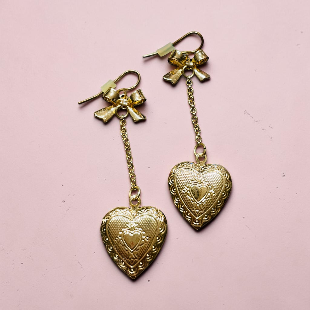Boucles d’oreilles cœurs pendants