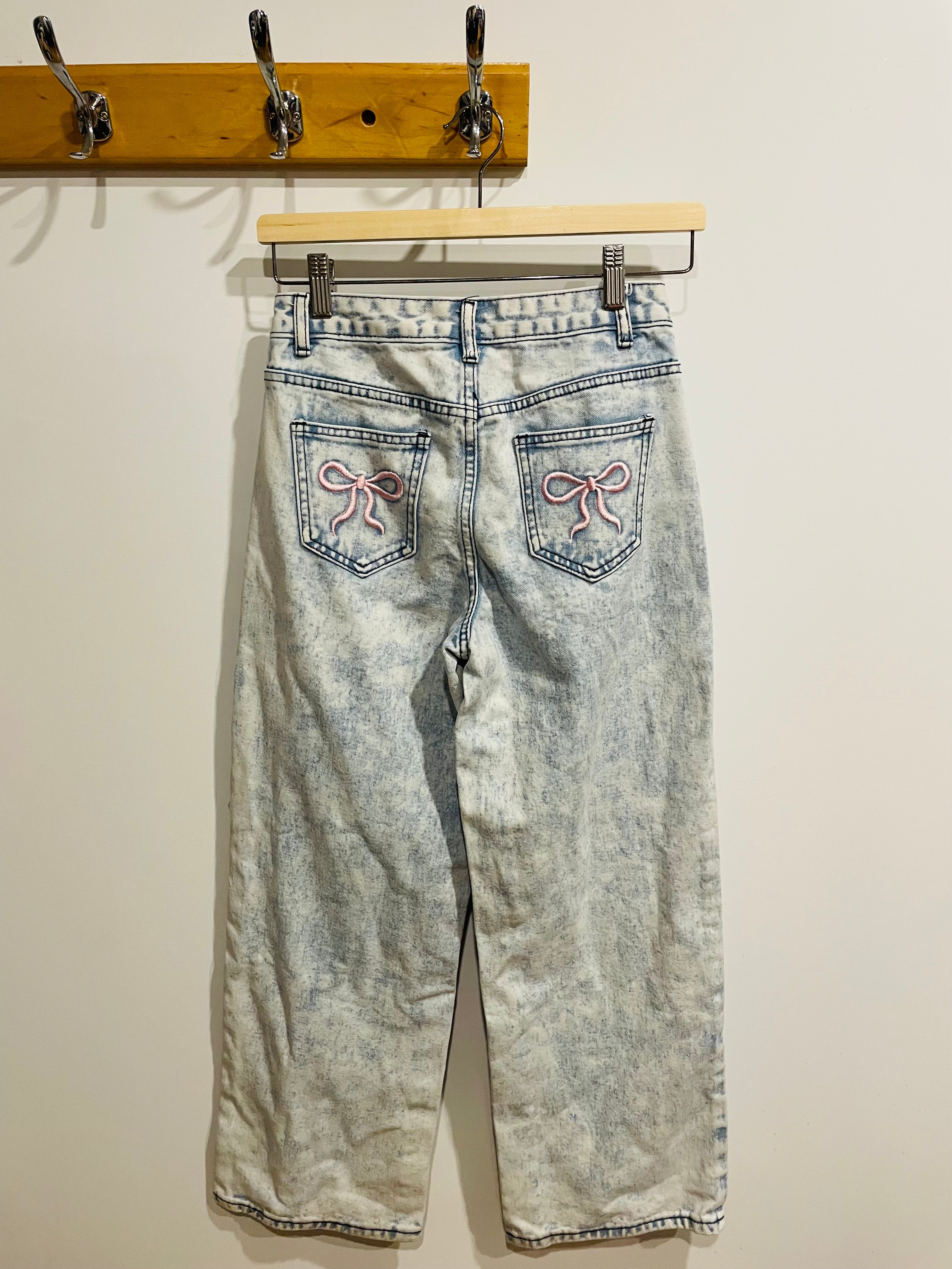 Washed-out jeans & 11 years old buckles