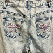 Washed-out jeans & 11 years old buckles