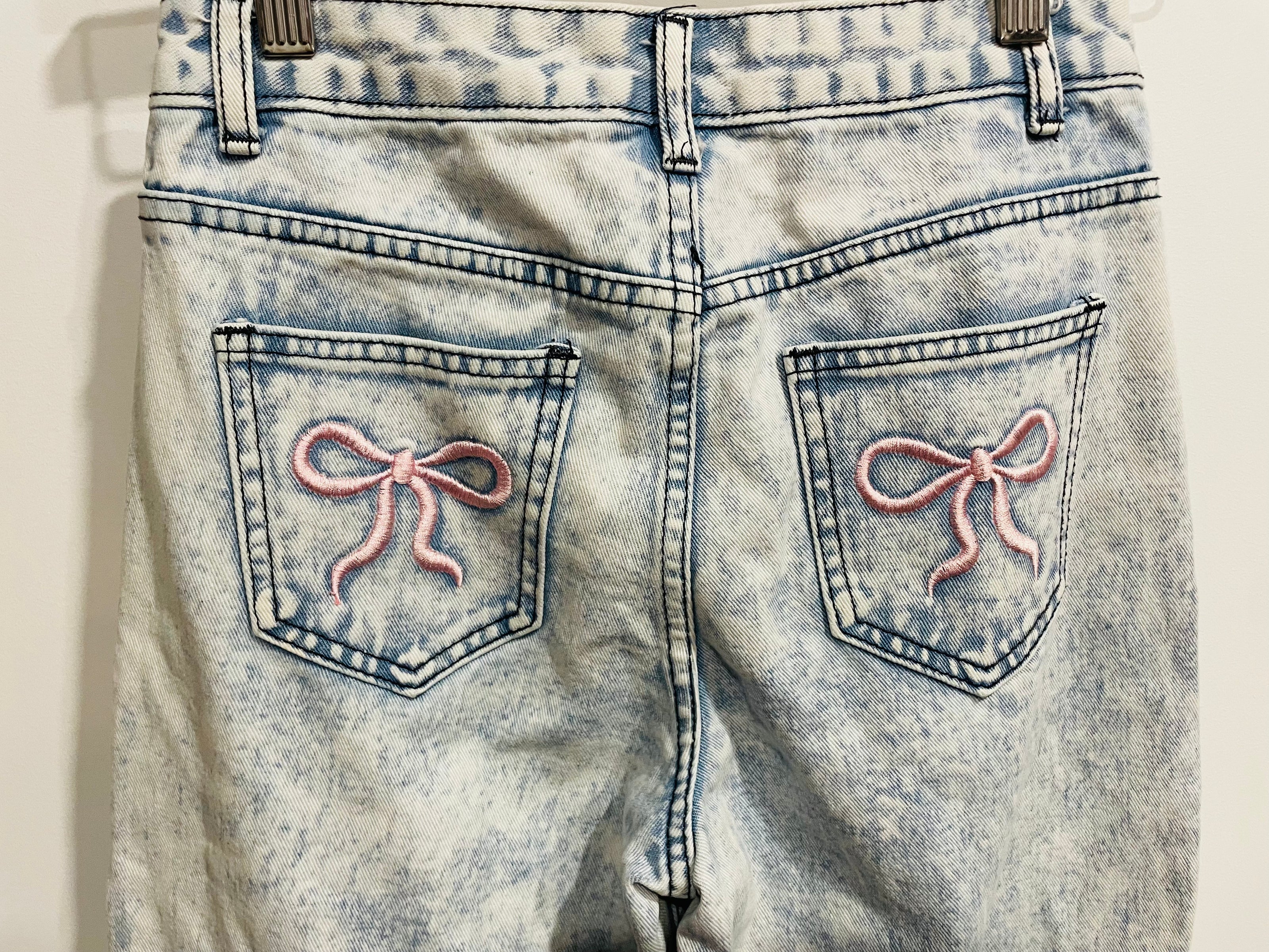 Washed-out jeans & 11 years old buckles