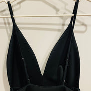 Jumpsuit noir a devant plongeant et a dos nu - Revamped - taille Small