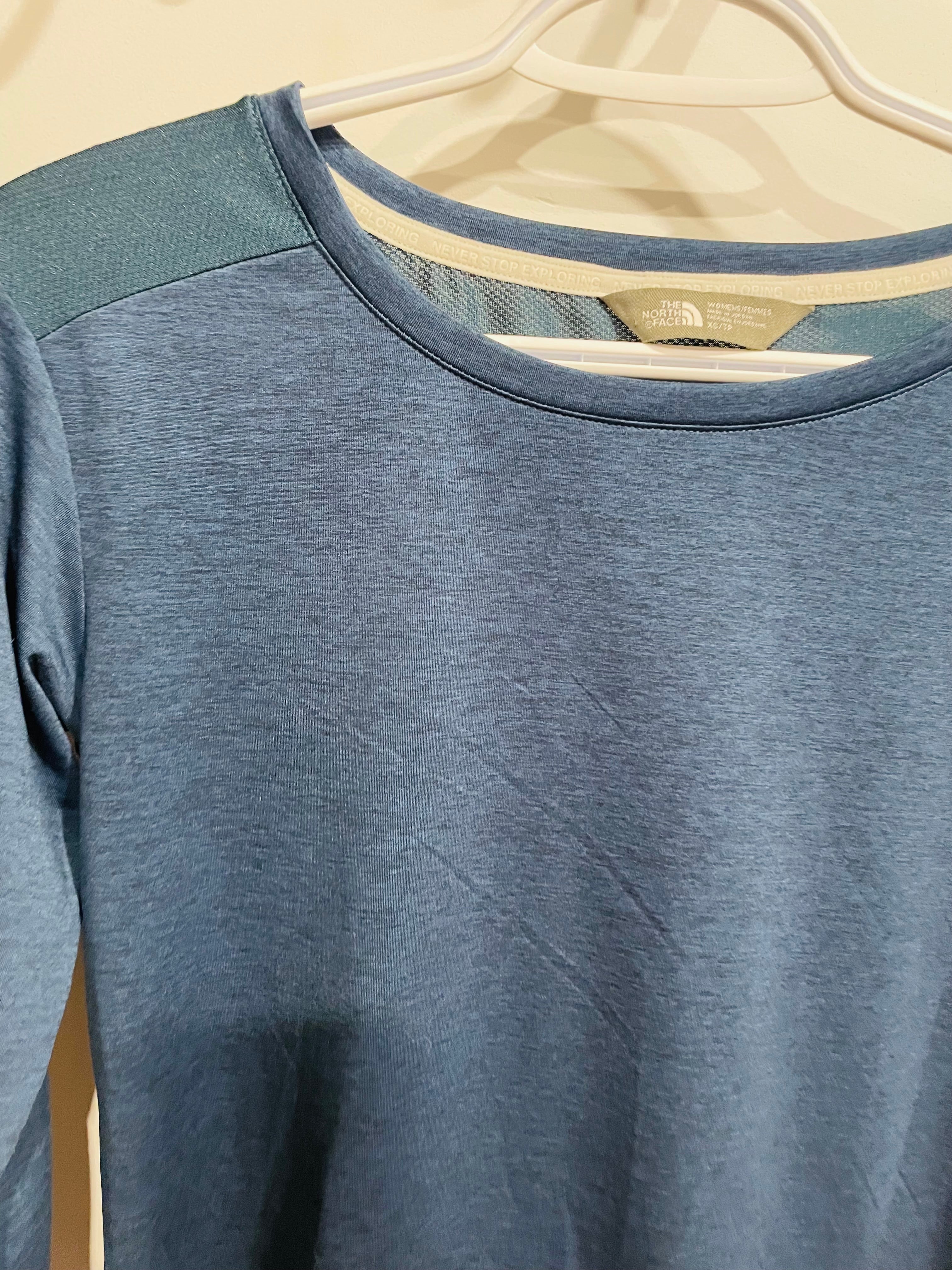 Blue sports top - the north face
